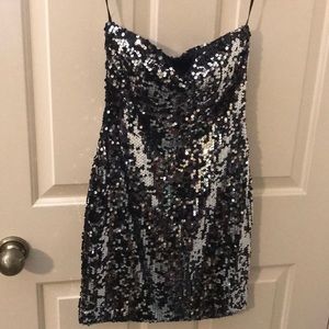 Silver and black sequined body con strapless dress